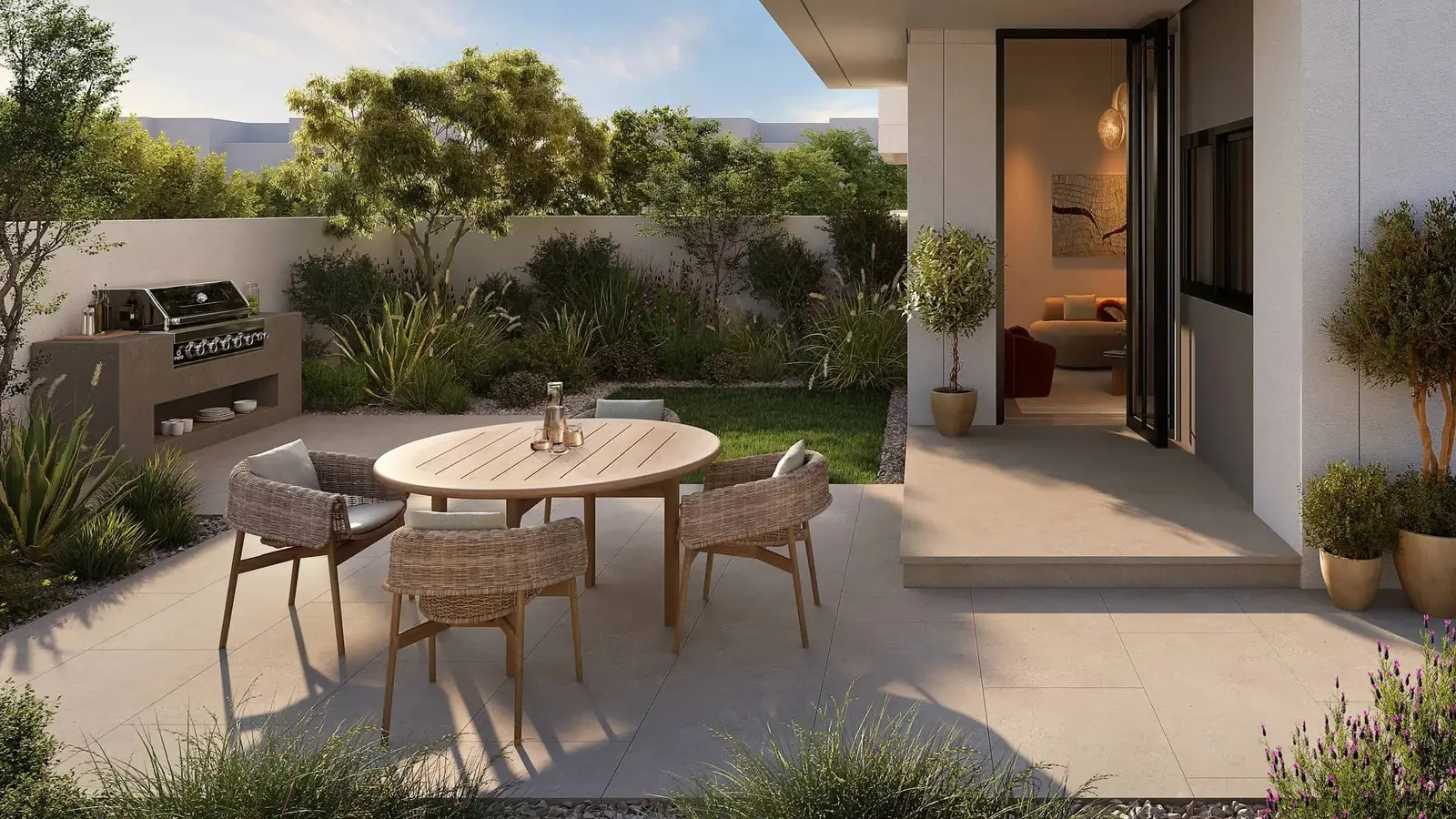 Front elevation of Al Ghadeer Parks villa with modern design, spacious frontage, and integrated greener