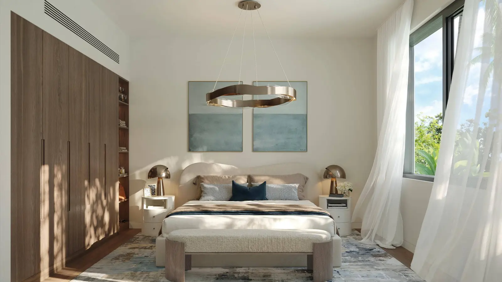 Spacious living room with large windows and natural light at Al Ghadeer Gardens townhouse in Abu Dhabi.