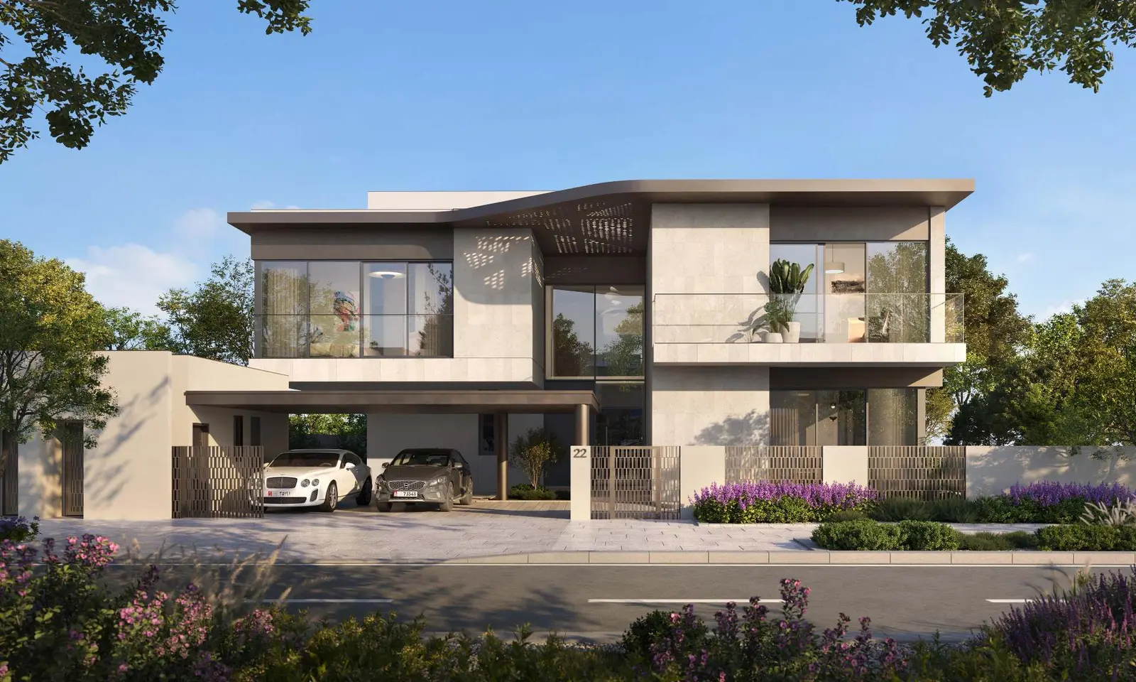 Luxury waterfront villa exterior at Talay, Saadiyat Island, featuring contemporary architecture and floor-to-ceiling windows.