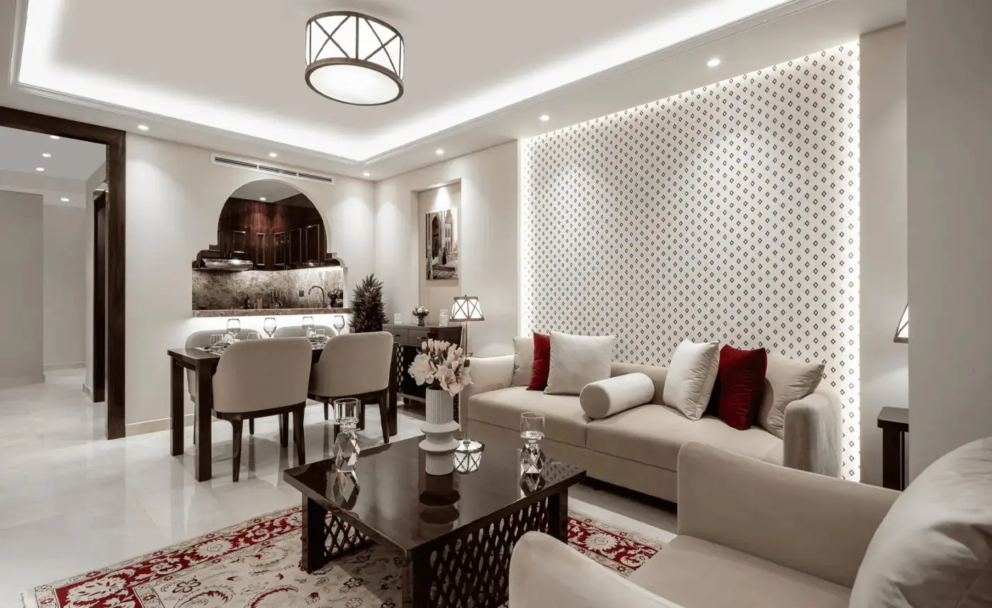 Modern semi-closed kitchen with branded appliances at Bab Al Qasr Residence 25.