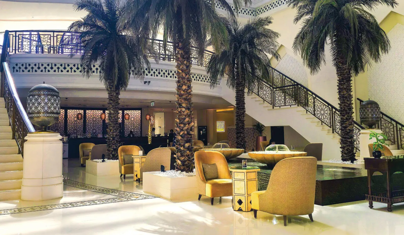 Bab Al Qasr Resort Residence 19 dining space in Masdar City Abu Dhabi with natural textures wood accents and refined lighting