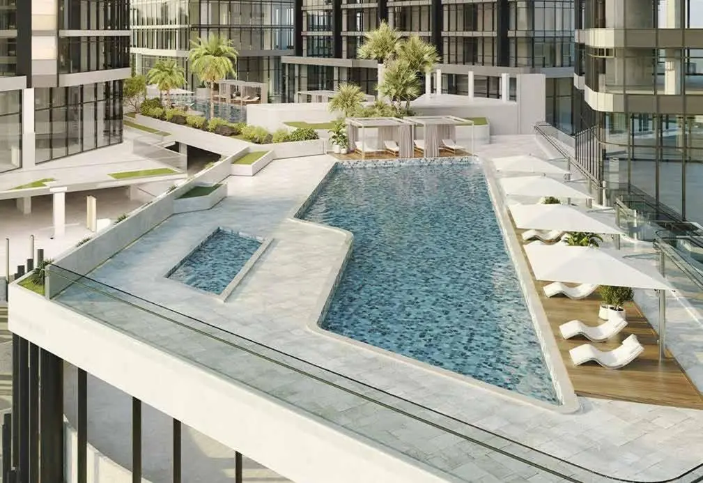 Modern waterfront facade of Radiant Bay apartments along the canal in City of Lights, Al Reem Island, Abu Dhabi.