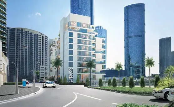 Beachfront view of Yasmina Residence located adjacent to coastal mangroves in Al Reem Island.