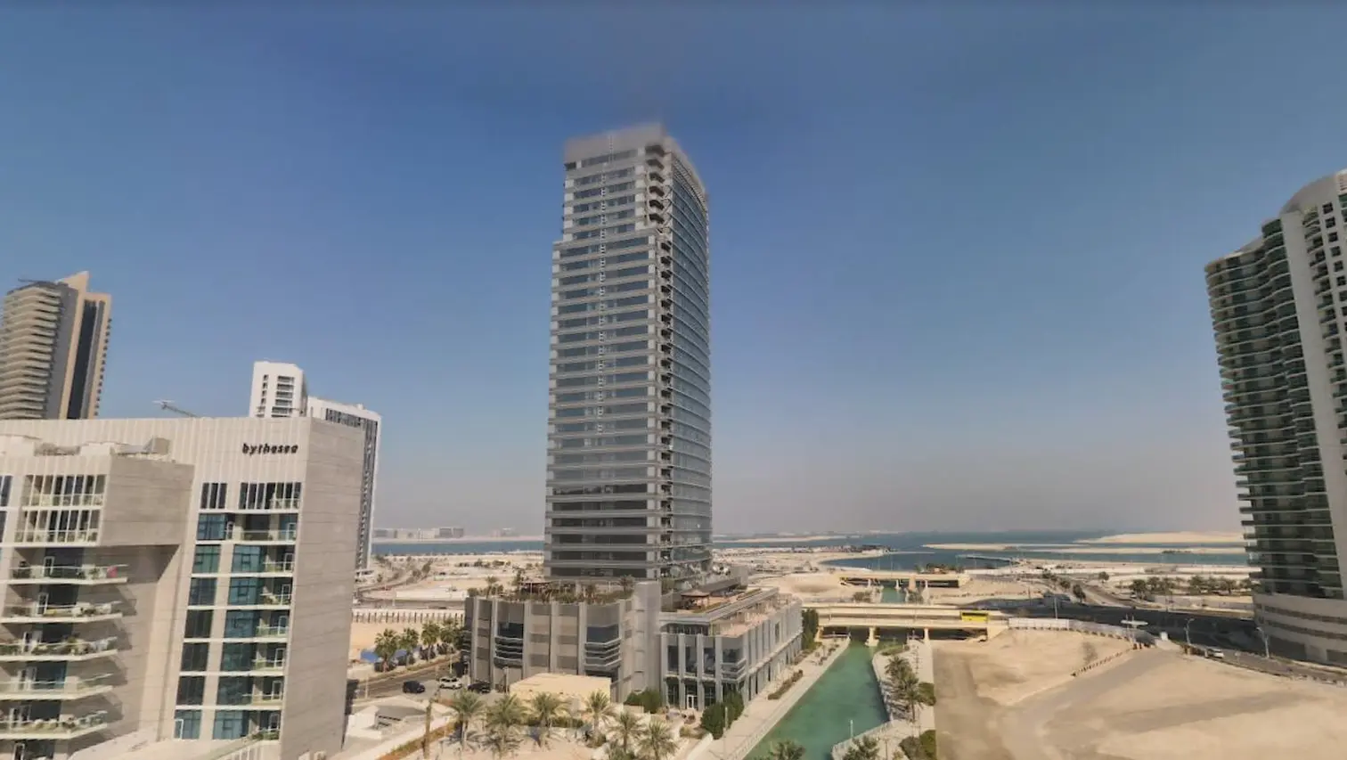 Modern thirty-two storey glass exterior of Al Wifaq Tower residential development located in Shams Abu Dhabi, Al Reem Island.