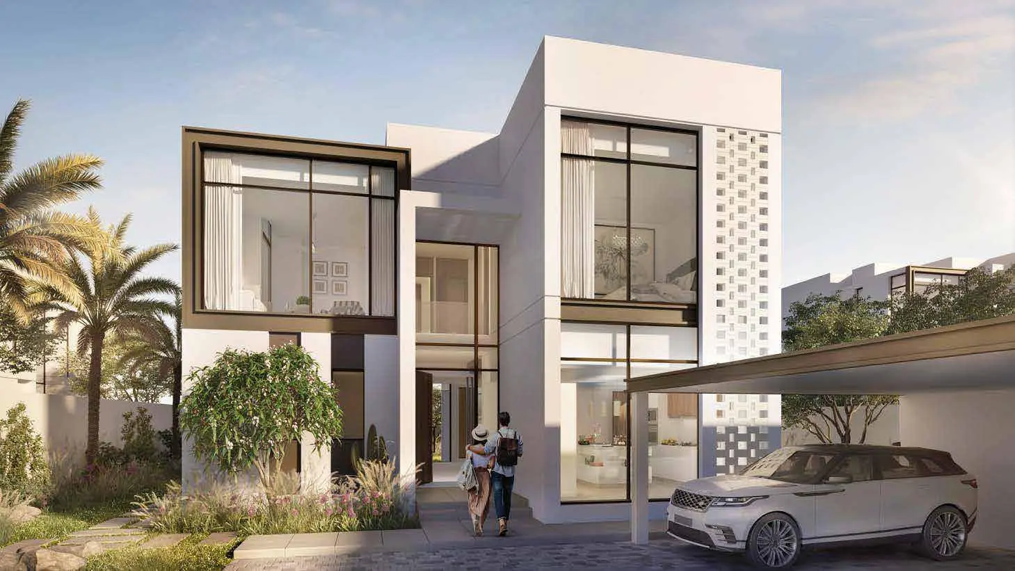 Seef Al Jubail evening exterior view of villas with warm lighting and landscaped grounds