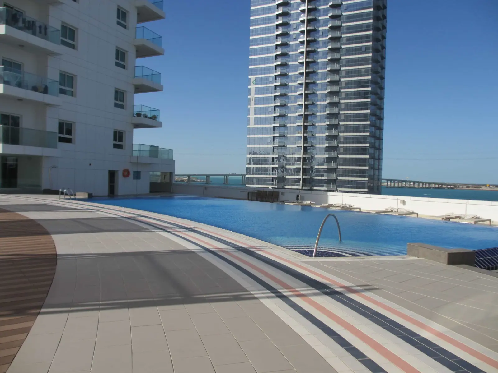 Modern twenty-two storey glass exterior elevation of Sea View Tower in Shams Abu Dhabi, Al Reem Island, UAE