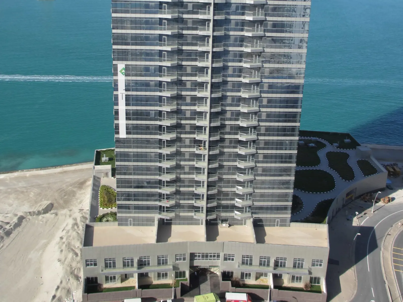 Temperature-controlled outdoor swimming pool and sun deck for residents at Sea View Tower, Shams Abu Dhabi, Al Reem Island.