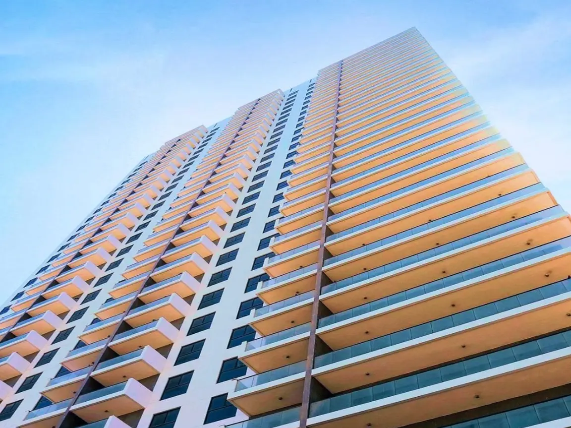 Twin residential tower exterior of Parkside Residence in Shams Abu Dhabi on Al Reem Island near canal promenade