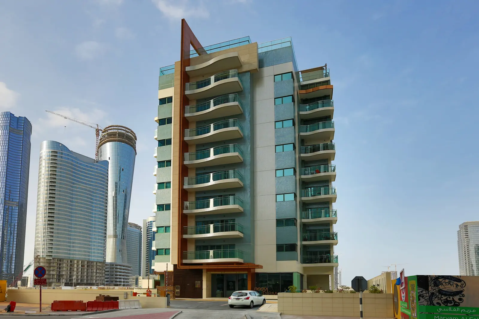 Boutique exterior facade of Reem Diamond residence in Shams Abu Dhabi on Al Reem Island featuring modern architectural balconies
