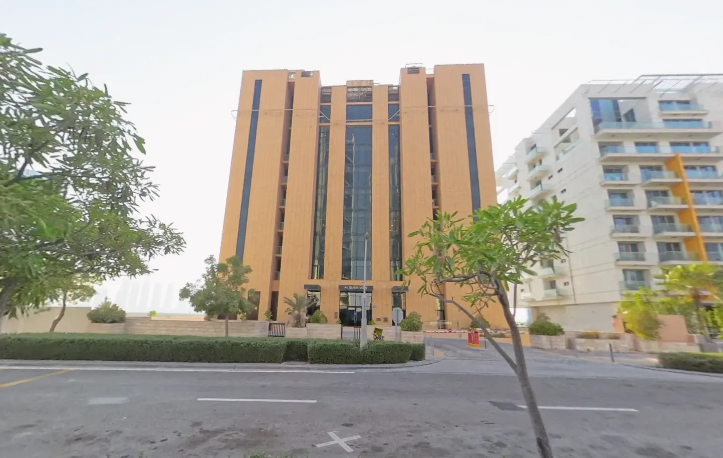 Sleek residential tower facade of Al Qurm View situated along the canal promenade in Al Reem Island Abu Dhabi