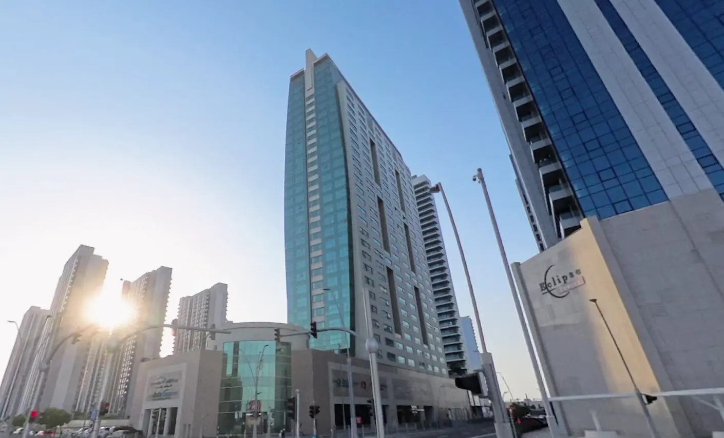 Spacious master bedroom interior with built-in wardrobes at Burj Al Shams luxury apartments Al Reem Island