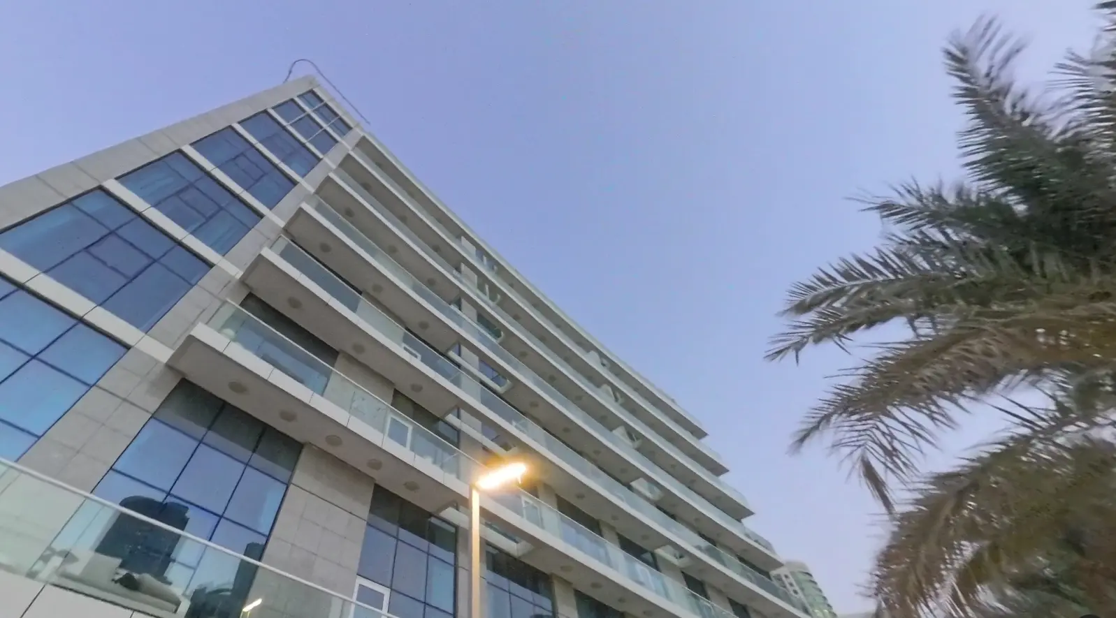 Modern nine-storey low-rise exterior elevation of By The Sea Tower in Shams Abu Dhabi, Al Reem Island, UAE.