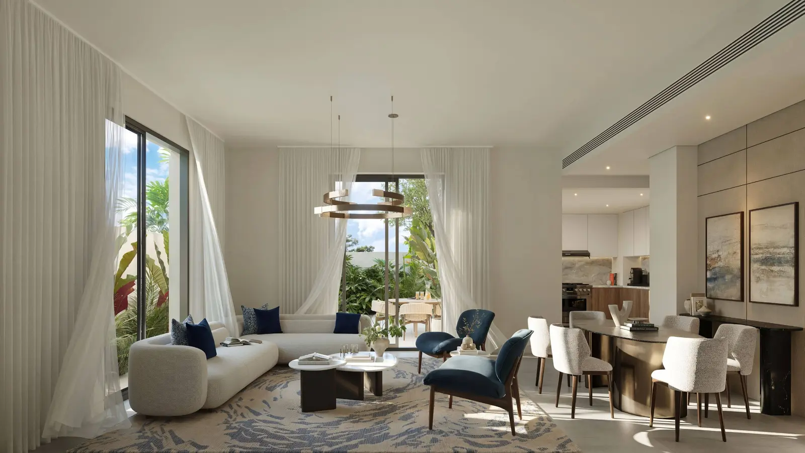 3. Al Ghadeer Parks 1 townhouse interior showcasing a bright open-plan living and dining area with contemporary architectural finishes.