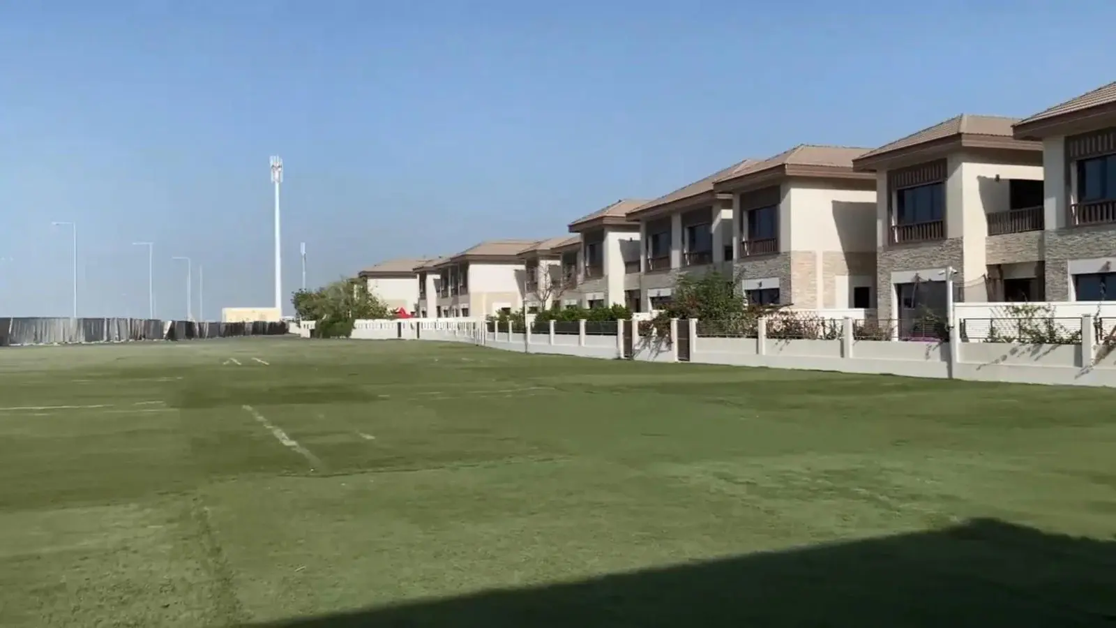 Central community clubhouse building hosting fitness gym and indoor games room at Nalaya Najmat Abu Dhabi