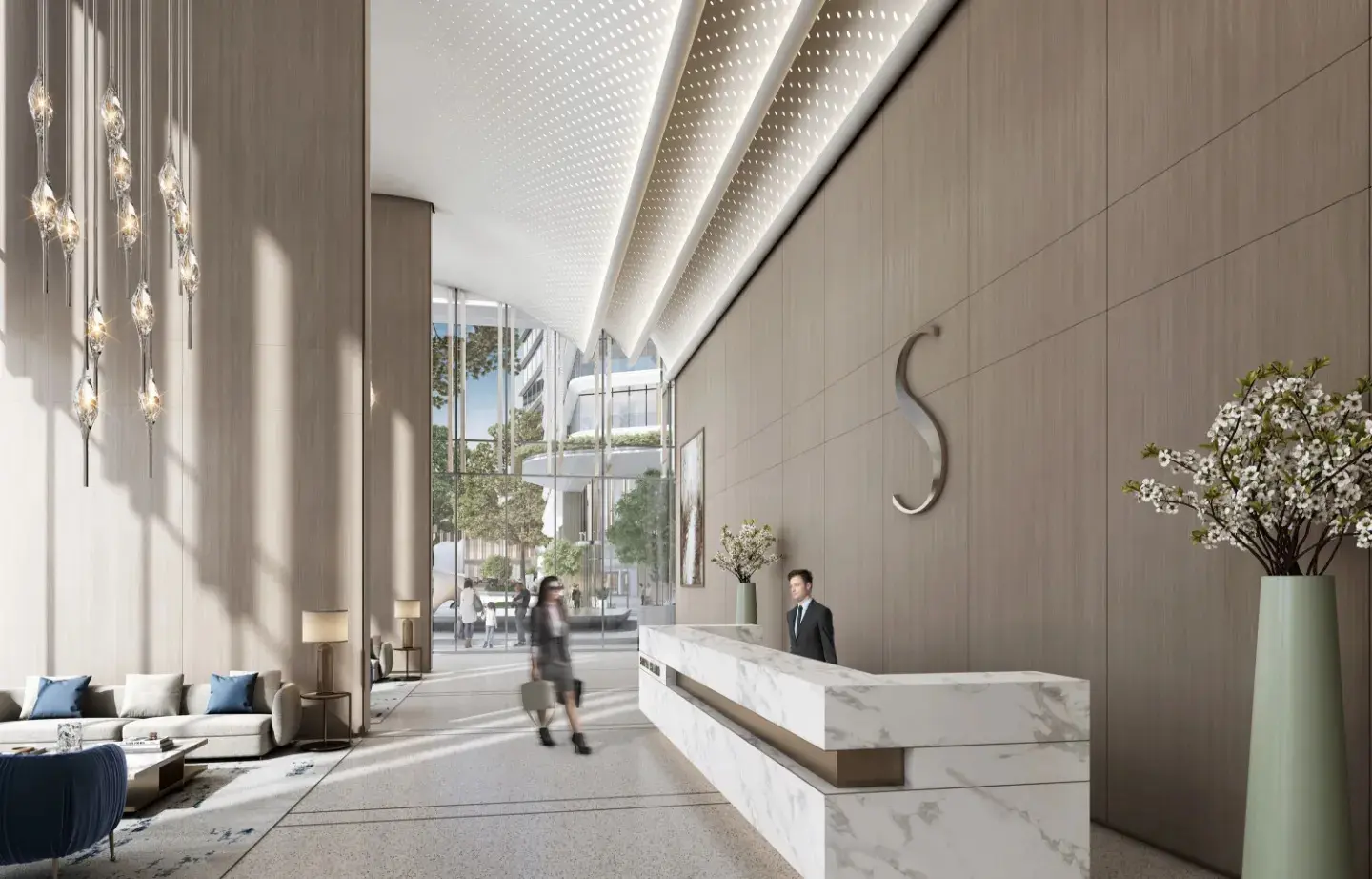 Aquamarine Beach Residences reception area on Sobha Siniya Island, Umm Al Quwain, showcasing welcoming interiors and refined residential design.