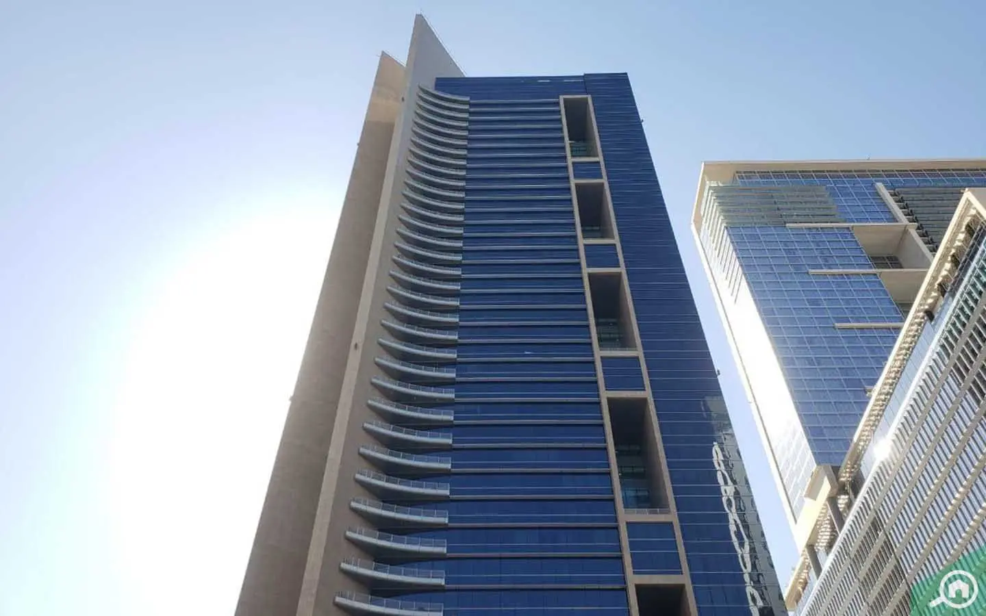 Ground floor retail entrance displaying on-site supermarket and cafes at Sky Gardens DIFC Dubai