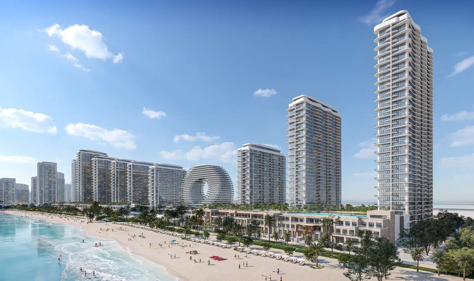 Panoramic exterior skyline view of luxury waterfront high rise towers at Bayfront Marina Residences in Umm Al Quwain