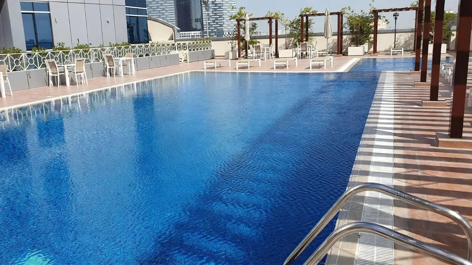 Al Muhaimat Tower community podium rooftop Al Reem Island Abu Dhabi residential tower lifestyle amenities gym pool gardens