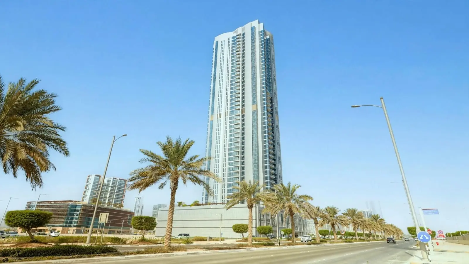 Al Muhaimat Tower exterior skyline view Al Reem Island Abu Dhabi residential project modern architecture premium lifestyle waterfront property.