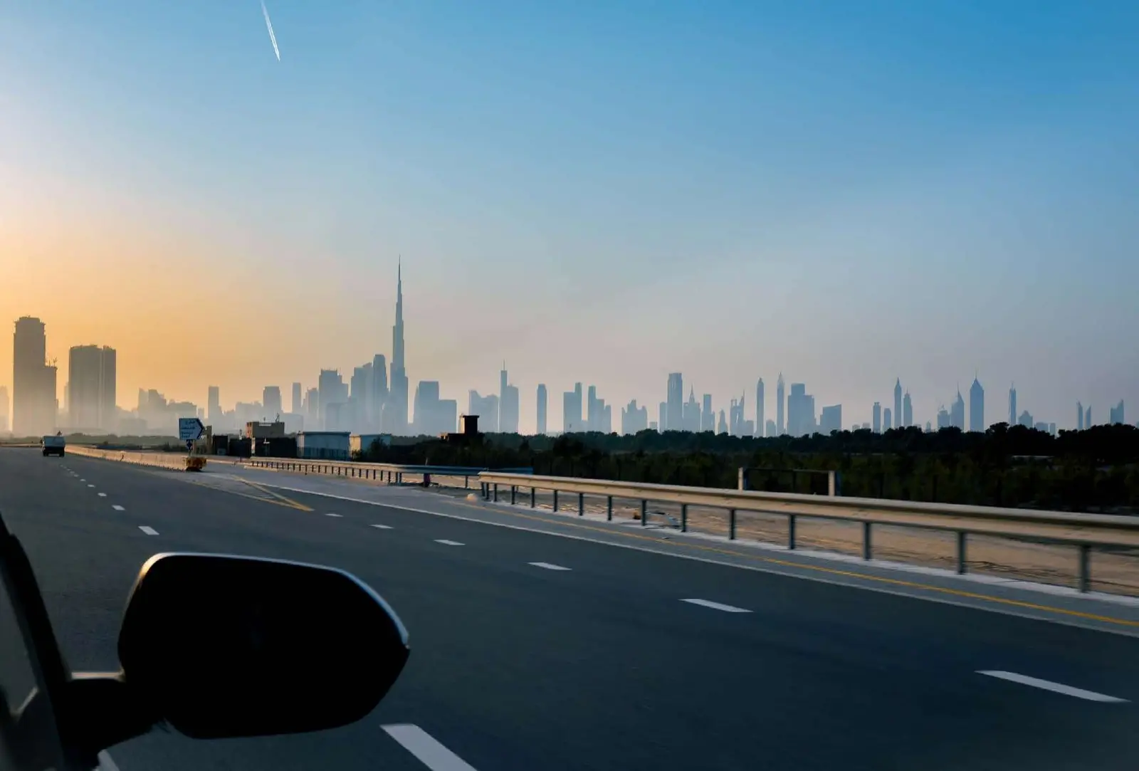 Highway connectivity bridge leading towards city skyline from Sobha Siniya Island near Pierside Marina Residences UAQ