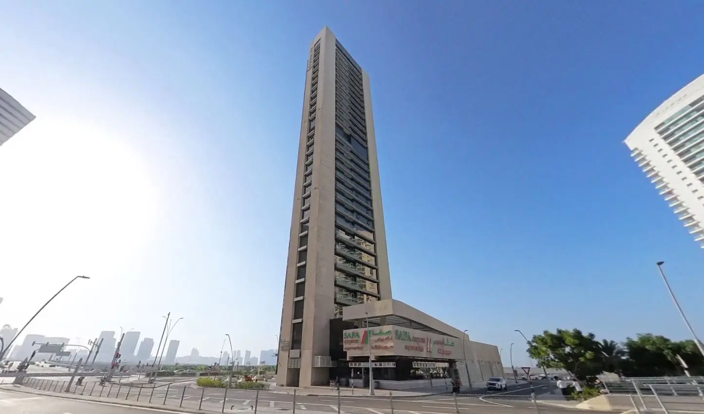 Al Beed Tower rising against the Abu Dhabi skyline, luxury high-rise living in Al Reem Island, UAE