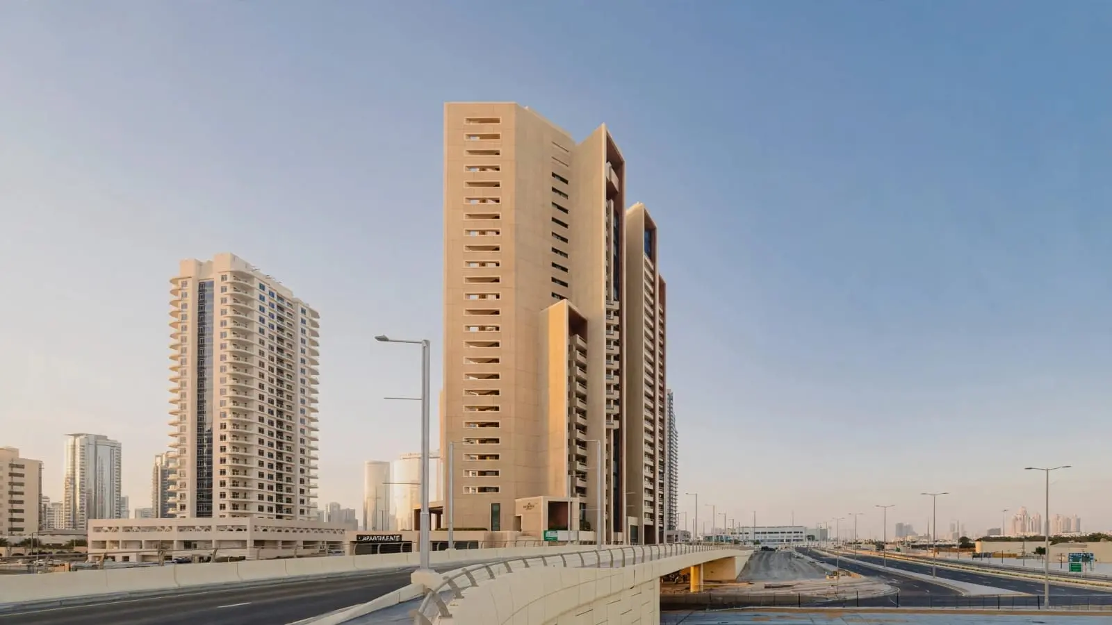 Al Reem Island Baheen Tower exterior view highlighting modern architectural design, premium residential tower, and vibrant waterfront lifestyle.