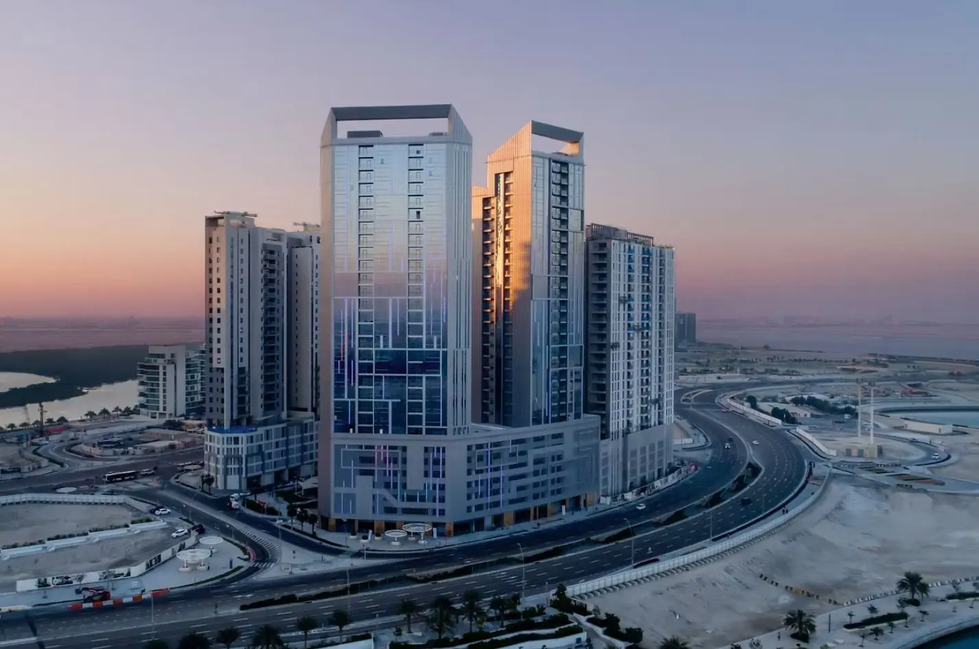 Landscaped podium gardens and outdoor pedestrian walkways surrounding Al Jeel Towers on Al Reem Island Abu Dhabi.