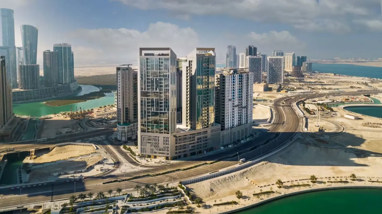 Panoramic exterior view of Al Jeel Towers situated along the Grand Canal promenade in Shams Abu Dhabi.