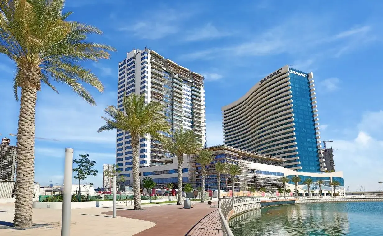 Exterior architectural facade of waterfront residential tower The Wave located in Najmat Al Reem Island Abu Dhabi UAE.