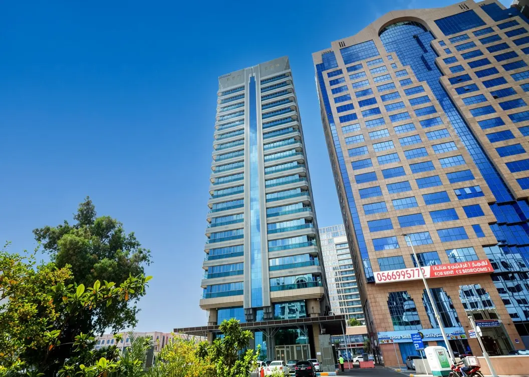 Al Heel Tower exterior building view showcasing its modern architecture in Al Khalidiyah, Abu Dhabi.