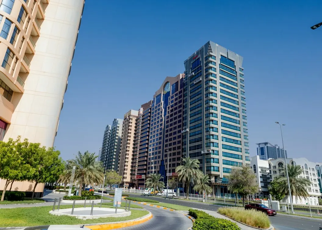 Al Heel Tower residential and commercial building facade overlooking the urban surroundings of Al Khalidiyah, Abu Dhabi.