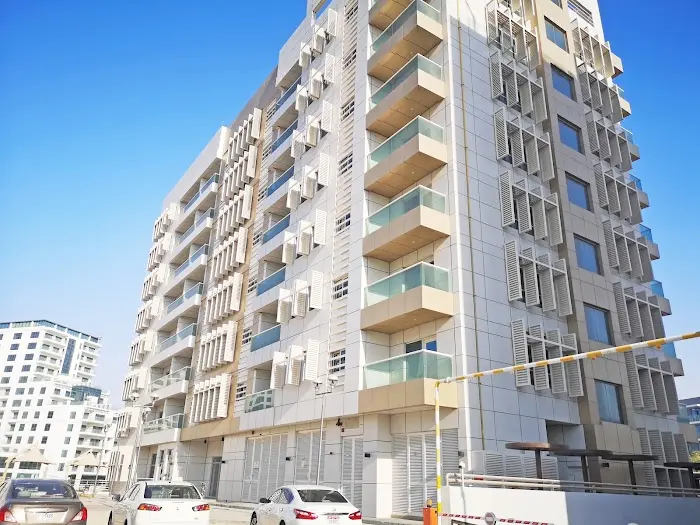 Exterior view of Al Saada Building in Al Raha Beach, Abu Dhabi, featuring its residential apartment architecture.