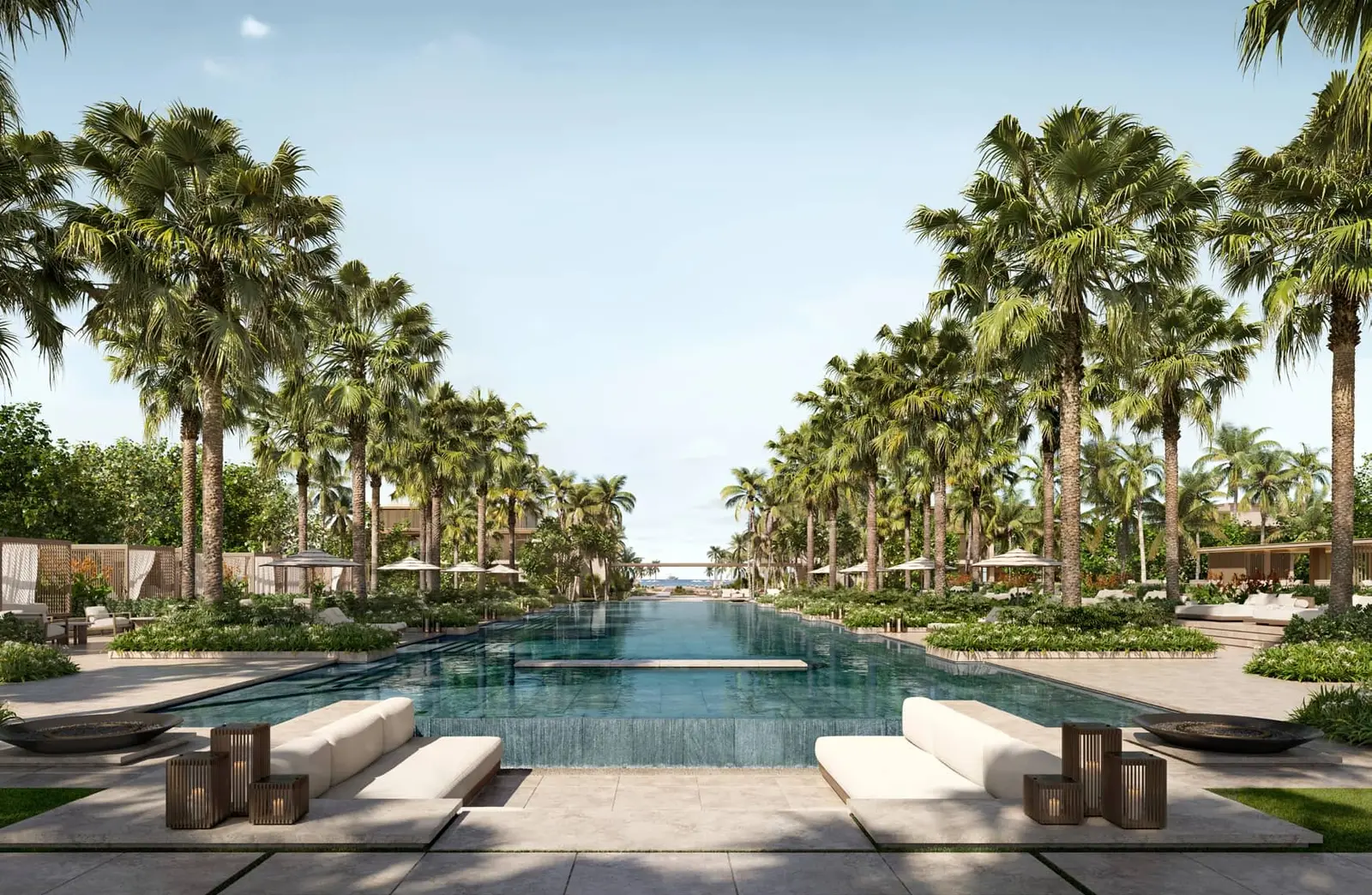 Aerial view of Four Seasons Private Residences Saadiyat Island highlighting beachfront villas and turquoise sea backdrop.
