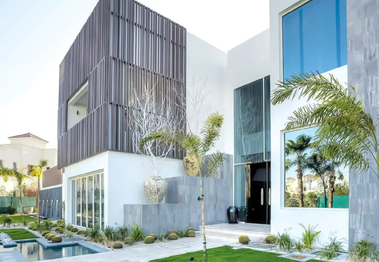 The Reserve Al Barari Dubai villa exterior featuring expansive private garden and nature-integrated design..jpg
