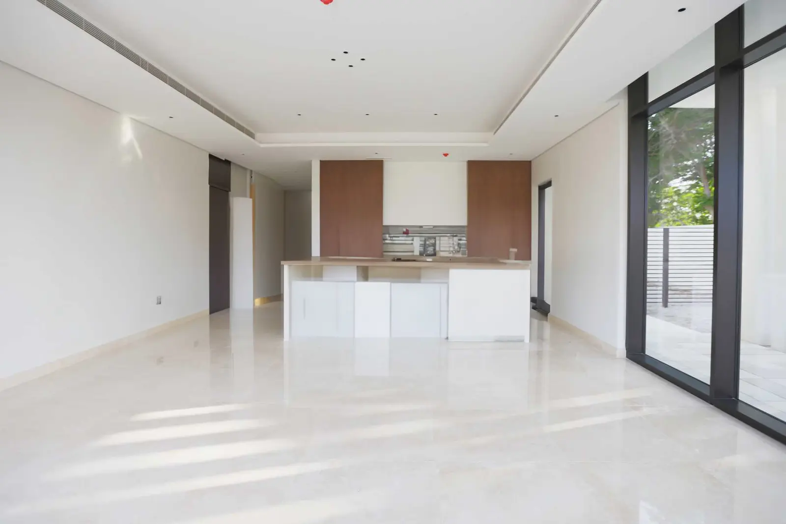 Bright interiors with floor-to-ceiling windows at Jawaher Saadiyat villas Saadiyat Island Abu Dhabi