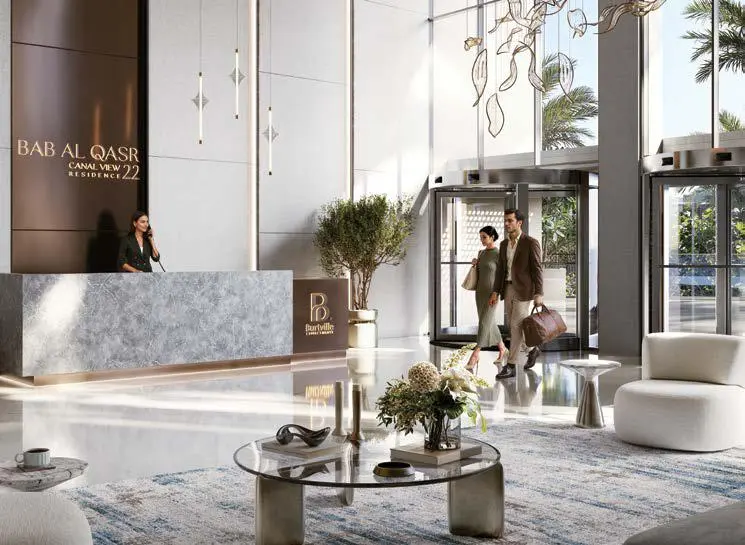 Spacious living room interiors with large windows at Bab Al Qasr Canal View Residence Al Raha Beach Abu Dhabi.jpg
