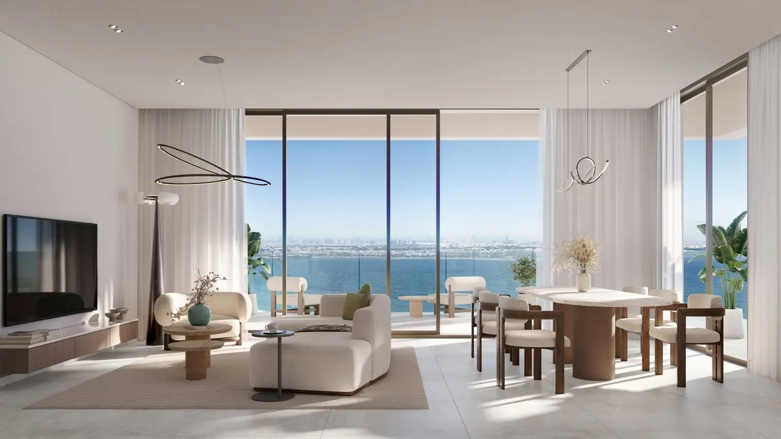 Open balcony of Bashayer Residences apartment with serene waterfront view and sunset over Abu Dhabi skyline.jpg