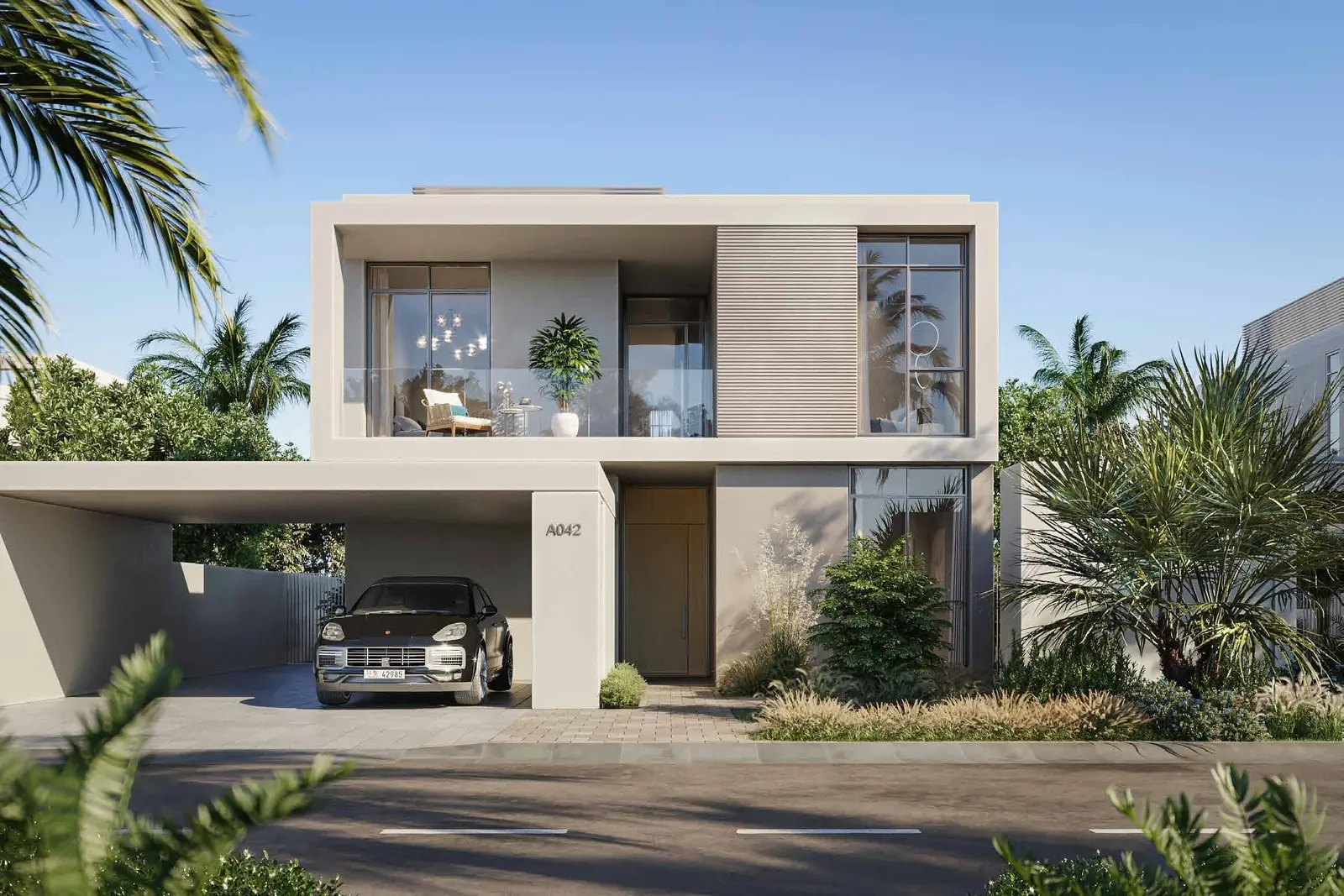 Sunset exterior of Fay Valley Masdar City Abu Dhabi UAE capturing warm lighting across modern villas and beautifully maintained community gardens..jpg