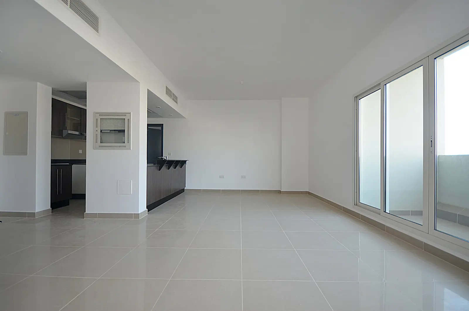 Modern kitchen interior at Al Reef Downtown, Al Reef Abu Dhabi featuring quality finishes and efficient storage solutions for everyday convenience