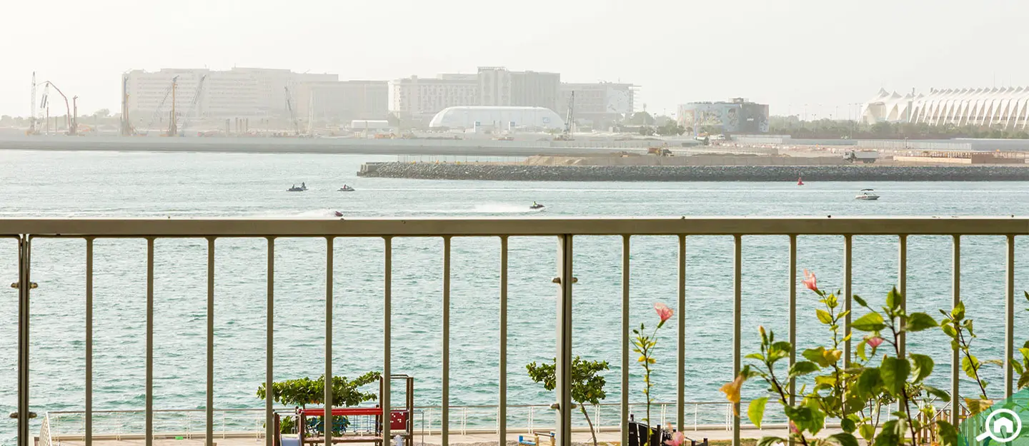 Al Dana development showcasing modern architectural design at Al Raha Beach, Abu Dhabi