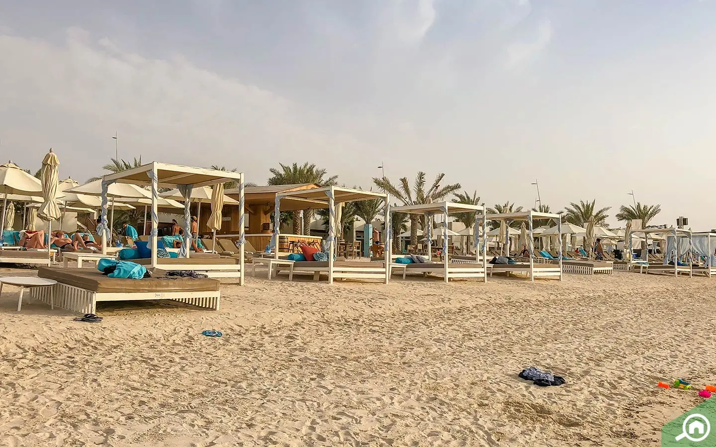 Beautiful exterior view of Al Dana townhouses in crescent-shaped island community