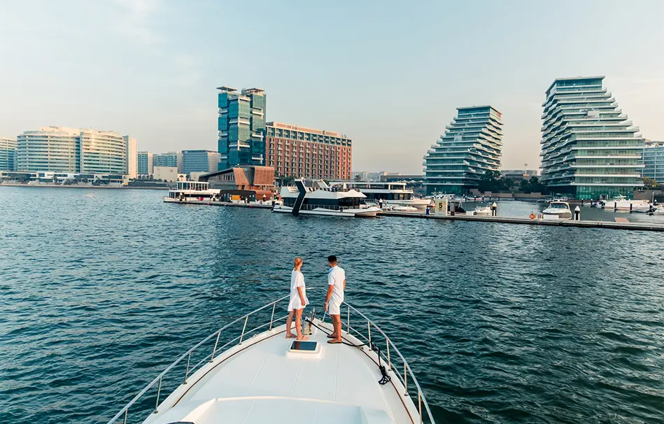 A wide shot of the Al Bandar complex with its pristine marina and landscaping