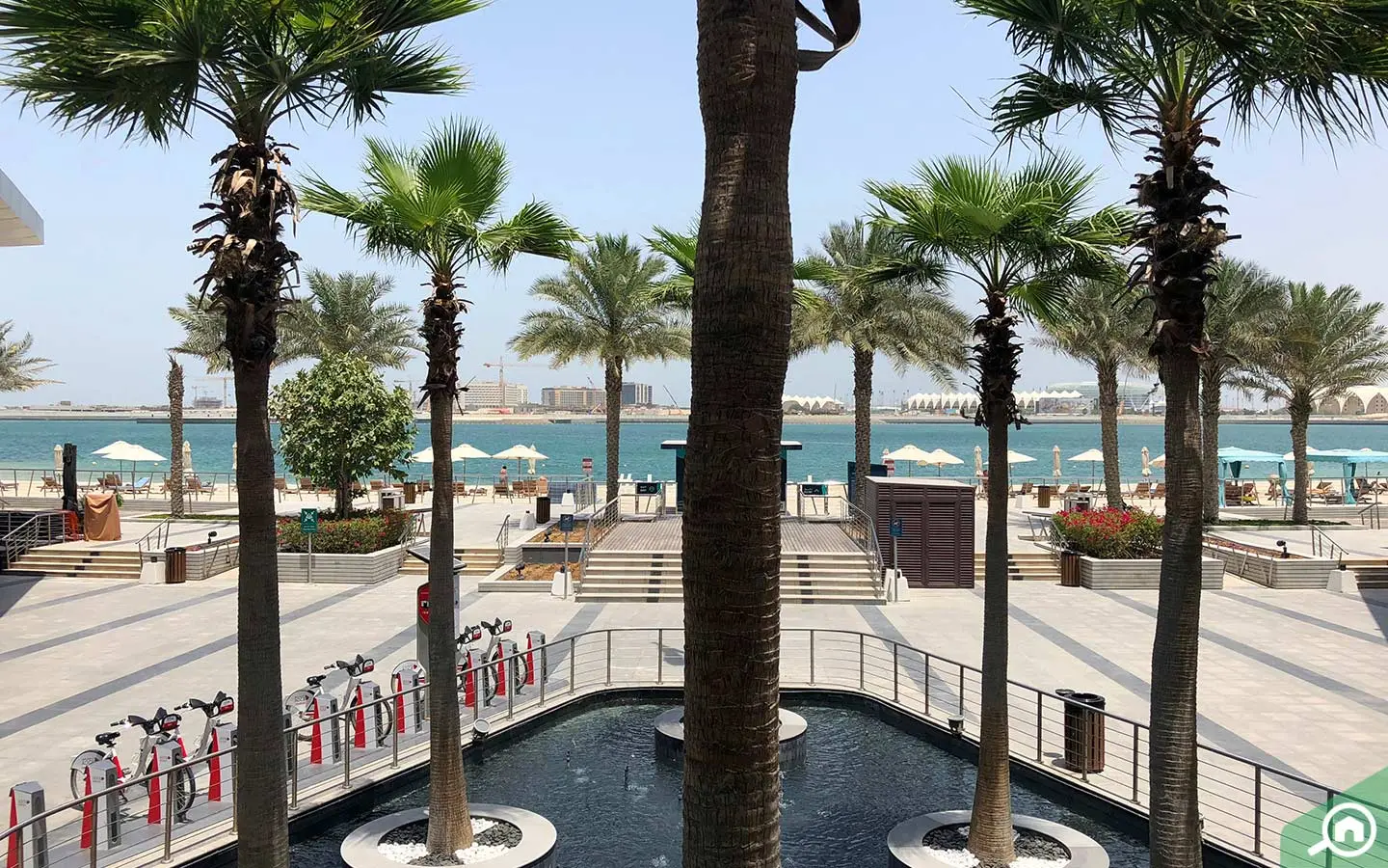Majestic view of the Al Bandar residential towers at sunset in Al Raha Beach