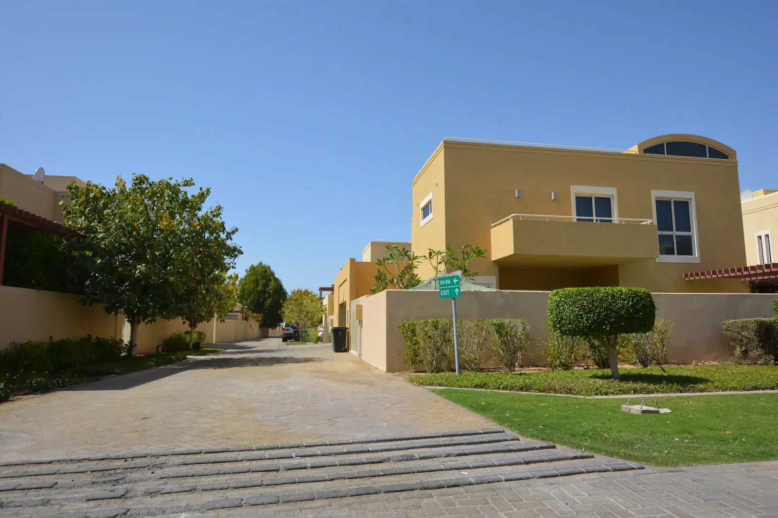 Spacious backyard and private garden of a villa at Al Raha Gardens, a serene oasis in Abu Dhabi.