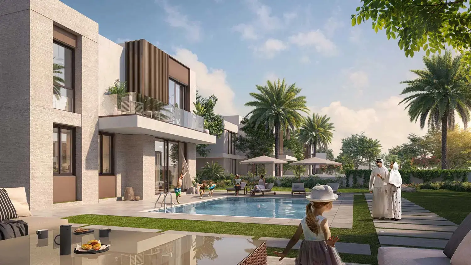 Rear garden with outdoor seating area and green space at Al Reeman II residence