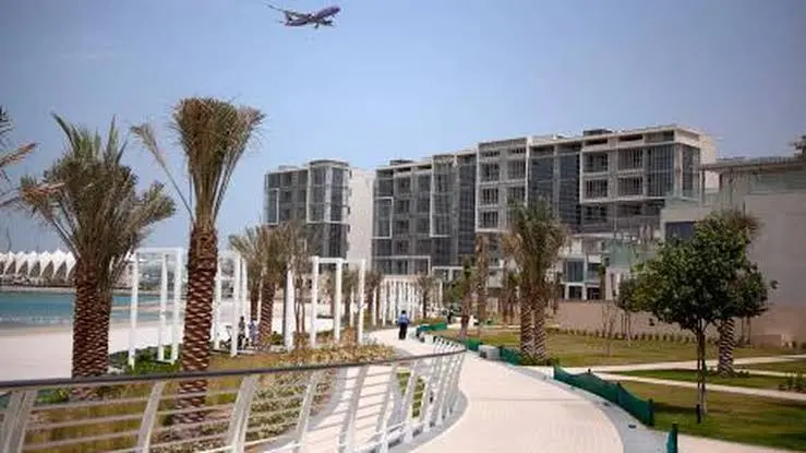 Al Zeina building facade with modern architectural design in Al Raha Beach