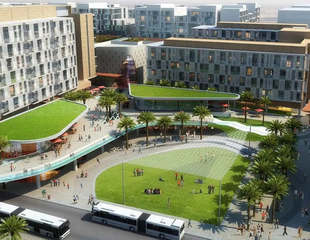 Master plan of Masdar City Phase 2 in Khalifa City showcasing sustainable mixed use districts, parks, transport links, and community facilities.