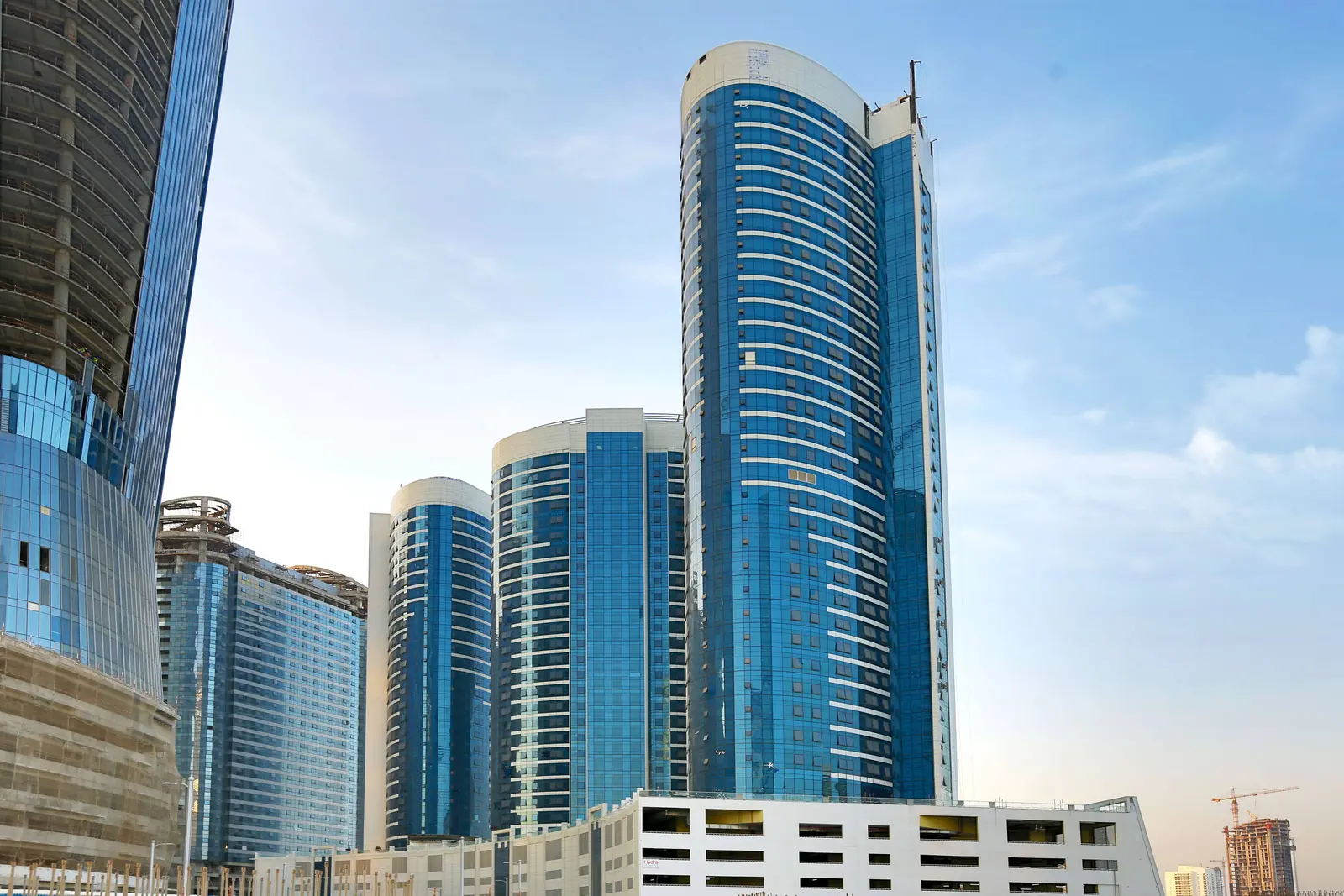 Elegant high-rise facade of Hydra Avenue Abu Dhabi overlooking the vibrant Al Reem Island waterfront community